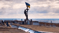 Військовий з Полтавщини підняв прапор над звільненим Високопіллям на Херсонщині