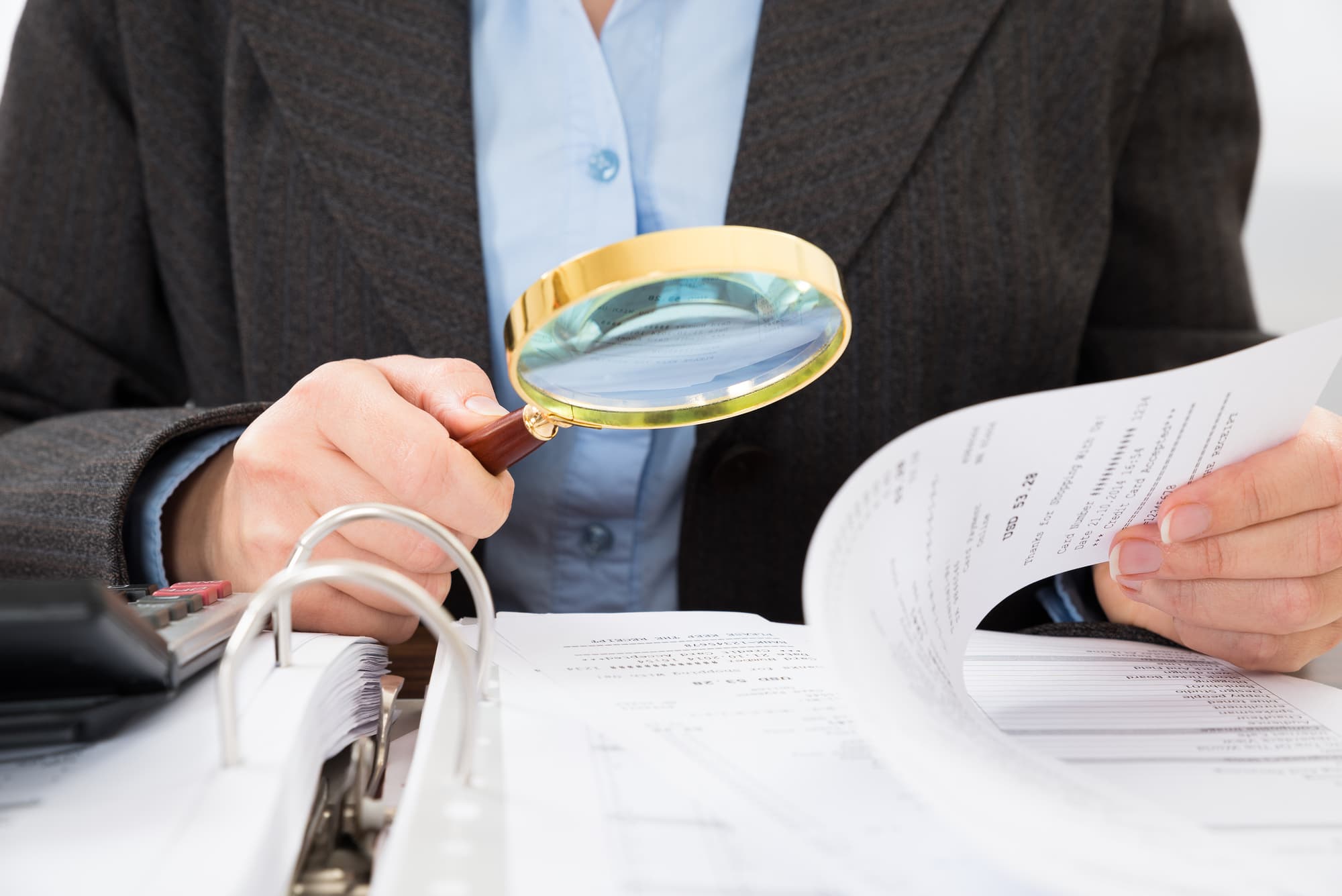 Businessperson Checking Bills
